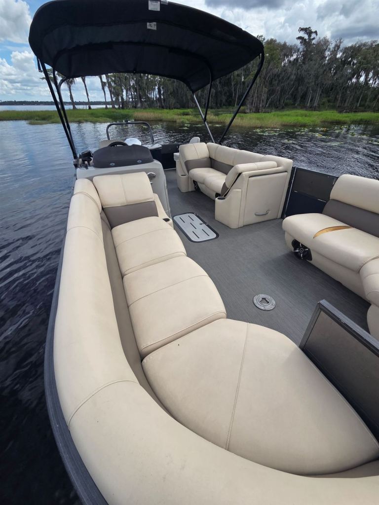Streak's plush beige lounge seating along both sides of the deck
